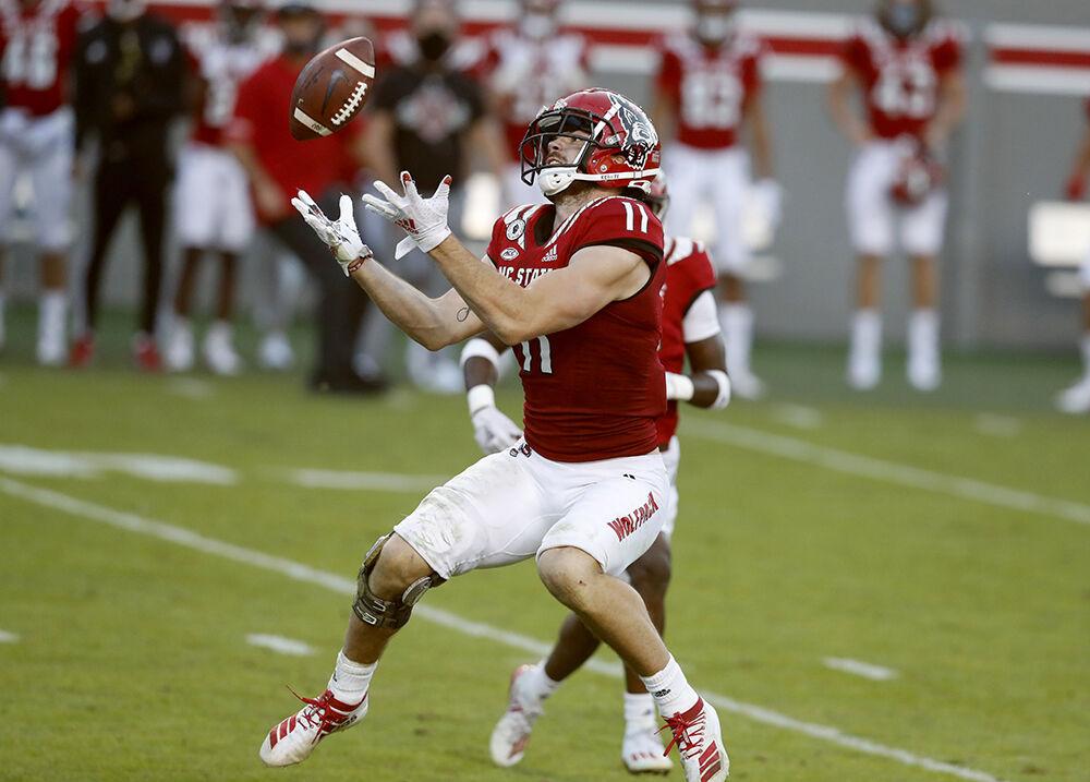 N.C. State linebacker Payton Wilson (11) makes an interception during the second half of N.C. State&#8217;s 31-20 victory over Duke at Carter-Finley Stadium in Raleigh, N.C., Saturday, Oct. 17, 2020.