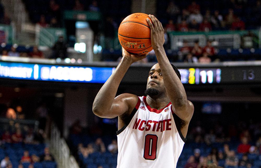Redshirt junior forward D.J. Funderburk shoots a free throw against Pittsburgh on Wednesday, March 11, 2020 at Greensboro Coliseum. Funderburk recorded 10 points and two blocks as the Wolfpack won their ACC Tournament opener 73-58.