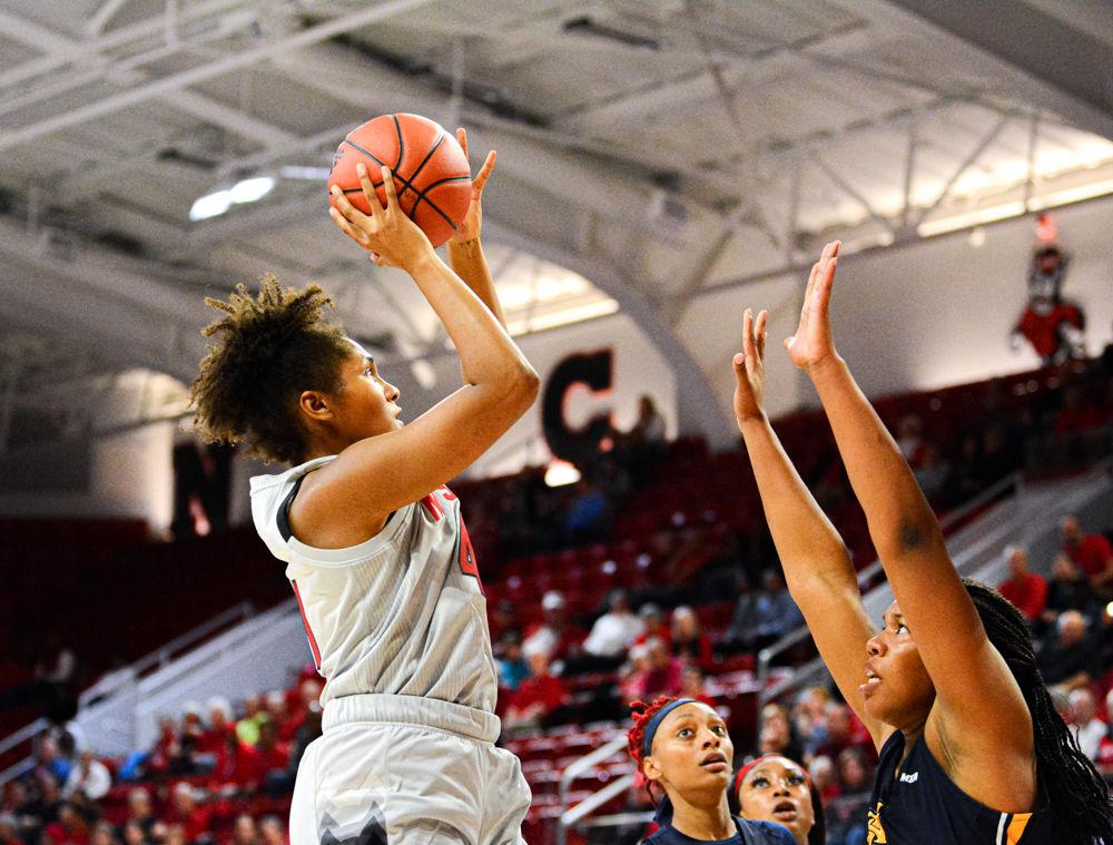 Freshman center Camille Hobby shoots against NC A&amp;T on Wednesday, Nov. 6, 2019 at Reynolds Coliseum. The Wolfpack won 80-44.