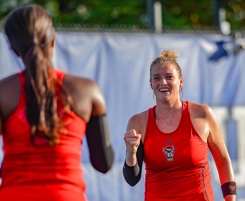 Junior Anna Rogers celebrates winning a point with freshman Alana Smith against Duke on Friday, May 10, 2019 at Ambler Tennis Stadium in Durham. Rogers and freshman Alana Smith beat Duke sophomore Kelly Chen and senior Ellyse Hamlin 6-2 during the Wolfpack&#8217;s 4-0 overall loss, ending their season in the Sweet Sixteen of the NCAA Tournament.