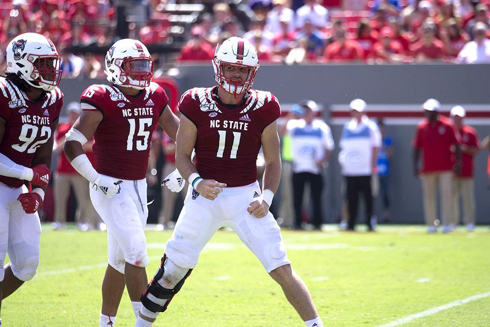 Redshirt freshman linebacker Payton Wilson celebrates after getting a tackle against ECU on Saturday, Aug. 31, 2019 in Carter-Finley Stadium. The Pack beat the Pirates 34-6.