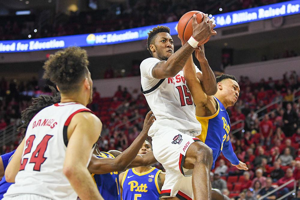 Redshirt freshman forward Manny Bates goes up for a shot during the game versus the Pittsburgh Panthers on Saturday, Feb. 29, 2020 in PNC Arena. Bates had his first career double-double with 13 points and 10 rebounds against the Panthers. NC State beat Pittsburgh 77-73.
