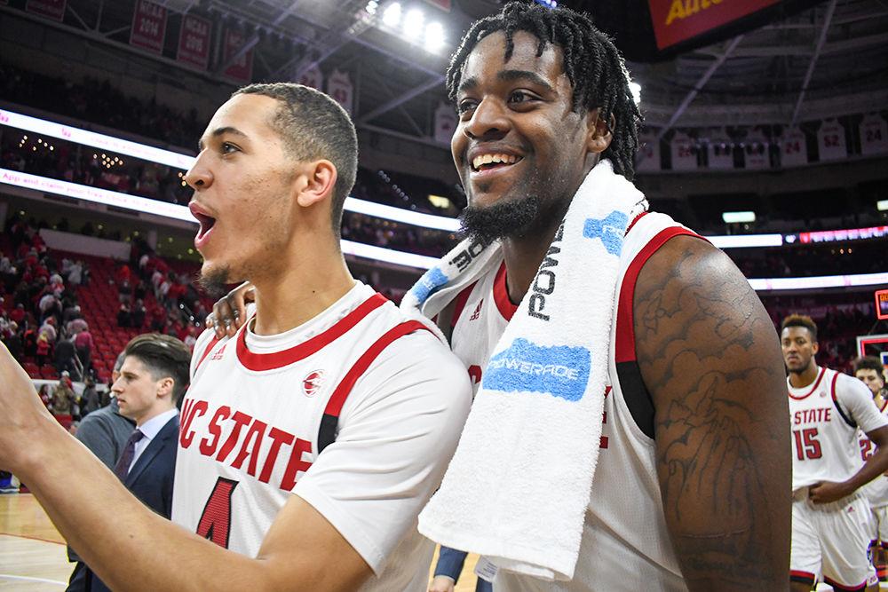 Redshirt junior DJ Funderburk and sophomore forward Jericole Hellems smile after the Wolfpack win over Pittsburgh on Saturday, Feb. 29, 2020. Hellems scored 16 points and Funderburk scored 14 points against the Panthers. NC State beat Pittsburgh 77-73.