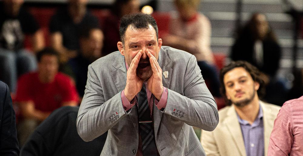 Head coach Pat Popolizio shouts toward redshirt junior Tariq Wilson during Wilson&#8217;s match against Princeton on Saturday, Jan. 11, 2020 at Reynolds Coliseum. The Wolfpack won the dual 29-12 with help from Wilson winning his match by major decision 13-4.