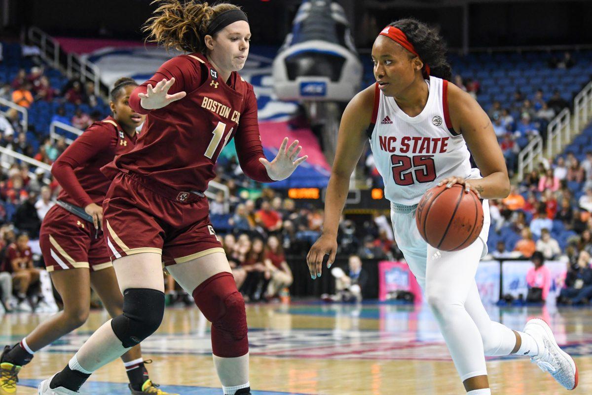 Junior forward Kayla Jones drives down the court during the semifinal game of the 2020 ACC Women's Tournament versus the Boston College Eagles on Saturday, March 7, 2020 in the Greensboro Coliseum. Jones scored 9 points and had 4 rebounds against Boston College. The Wolfpack beat the Eagles 82-75 to advance to the championship game against Florida State.