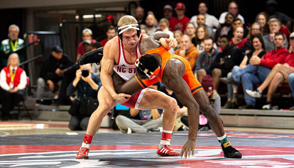 Redshirt junior Hayden Hidlay wrestles Princeton sophomore Quincy Monday on Saturday, Jan. 11, 2020 at Reynolds Coliseum. Hidlay defeated Monday by decision 7-2, helping the Wolfpack to a 29-12 dual win.