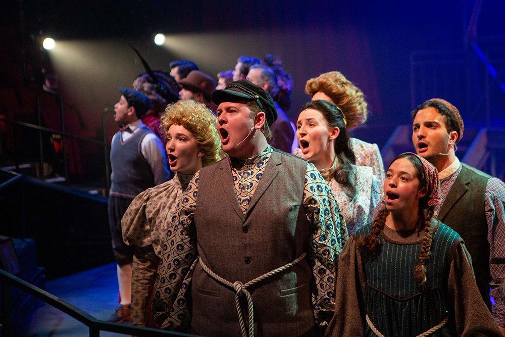 The Lower East Side ensemble sings as part of the opening number of Ragtime, a musical put on by the University Theatre. The cast prepares for opening night with this dress rehearsal on Monday, Feb. 17, 2020 in Stewart Theater.