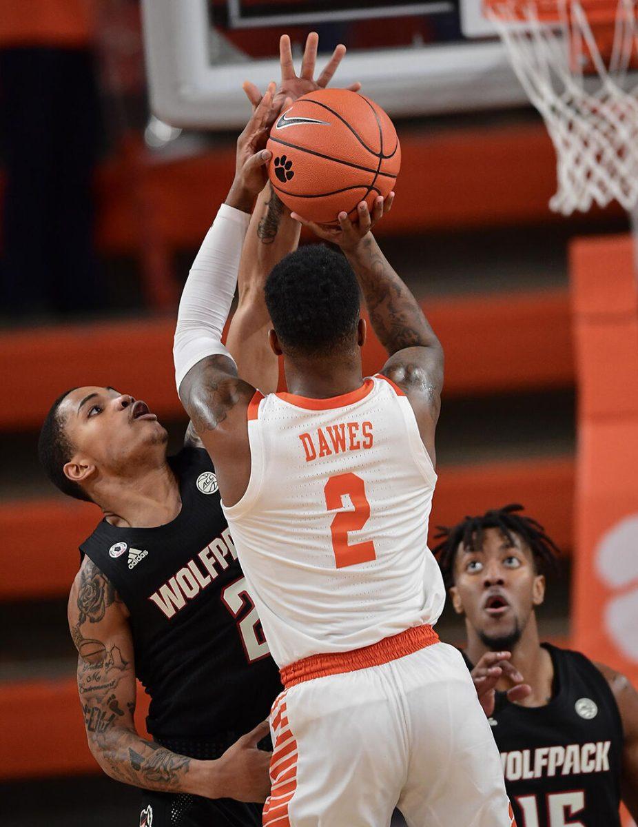 NC State guard Shakeel Moore(2) defends Clemson sophomore guard Al-Amir Dawes(2) during the first half Jan 5, 2021; Clemson, South Carolina, USA; at Littlejohn Coliseum. Mandatory Credit: Ken Ruinard-USA TODAY Sports