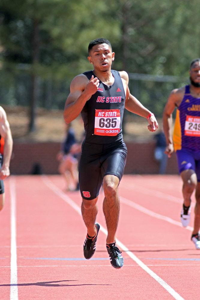 Redshirt Sophomore Junpai Dowdy runs during the 400 meter dash during the Raleigh Relays on Friday March 29, 2019 at the Paul Derr Track &amp; Field Facility. Dowdy finished eighth in the event with a time of 47.73.