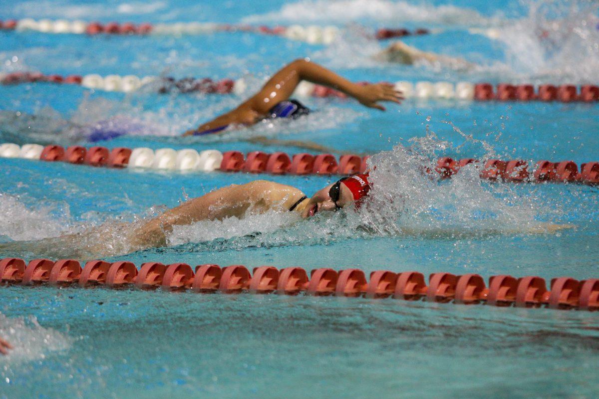 Junior Kate Moore swims the 200 yard freestyle. Moore placed second with a 1:49.54. The Wolfpack women took down Duke 181-116 in Casey Aquatic Center on Saturday, Jan. 18.