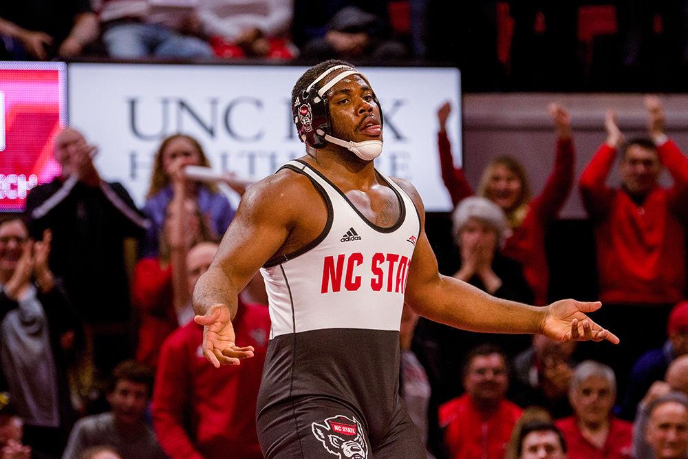 Sophomore Deonte Wilson celebrates after beating John Borst 3-1 on Friday Feb. 14, 2020 at Reynolds Coliseum. The NC State wrestling team beat Virgina Tech with an overall team score of 21-18.