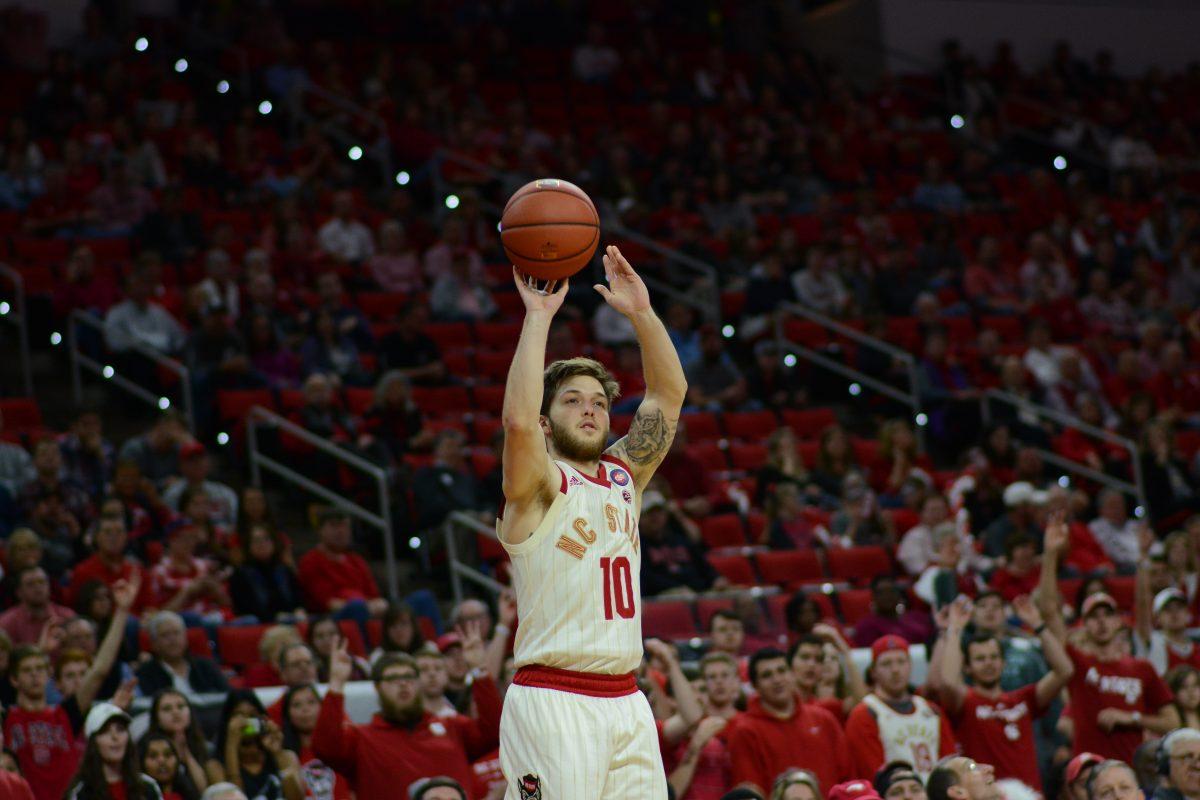 Sophomore guard Braxton Beverly shoots against Wake Forest on Sunday, Feb. 24, 2019 at PNC Arena. Beverly recorded 8 points and four assists in the Wolfpack&#8217;s 94-74 win.