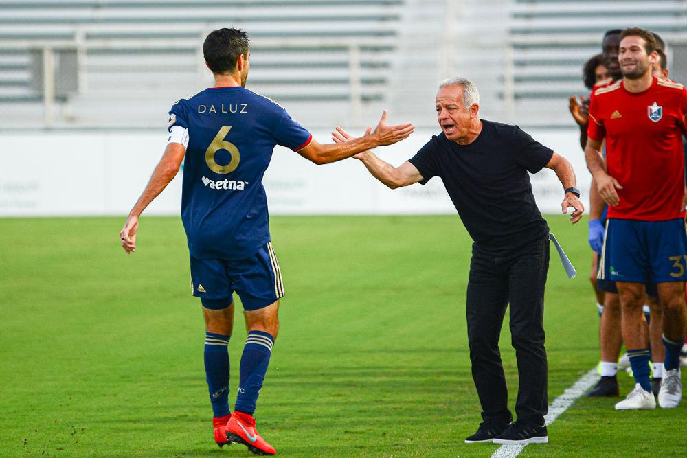 NCFC midfielder Austin da Luz celebrates his goal with head coach Dave Sarachan against Bethlehem Steel FC on Saturday, Sept. 7 at WakeMed Soccer Park. The match ended in a 3-3 draw.