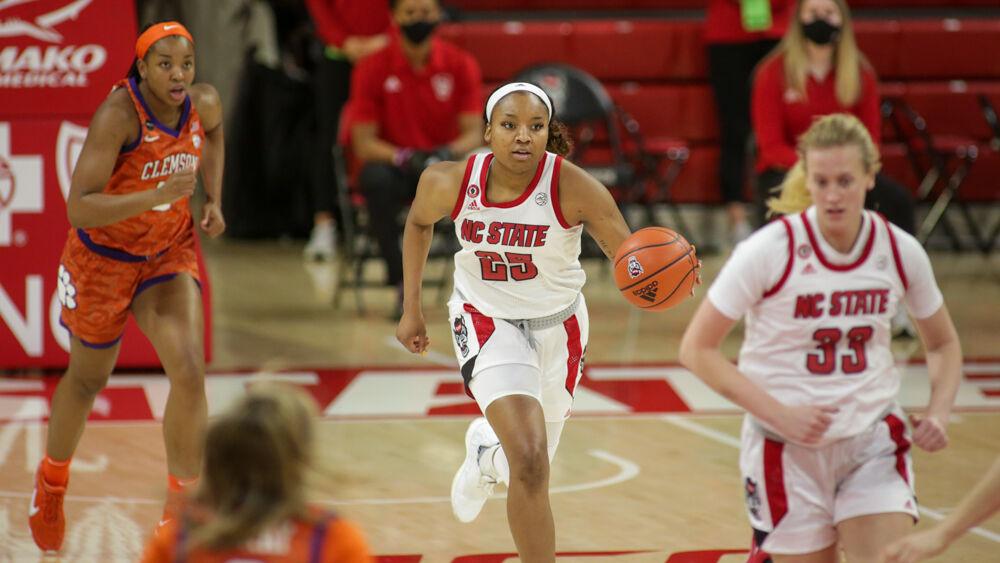 Senior forward Kayla Jones brings the ball upcourt. No. 4 NC State women&#8217;s basketball took on Clemson on Thursday, Feb. 11, 2021 in Reynolds Coliseum.