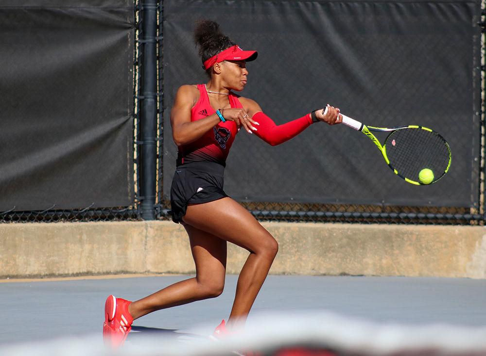 Lexi Keberle, a junior studying sports management, returns the volly in her singles match on March, 1 2020 against Virginia at J.W. Isenhour Tennis Center. Keberle achieved a 25-11 record in singles.