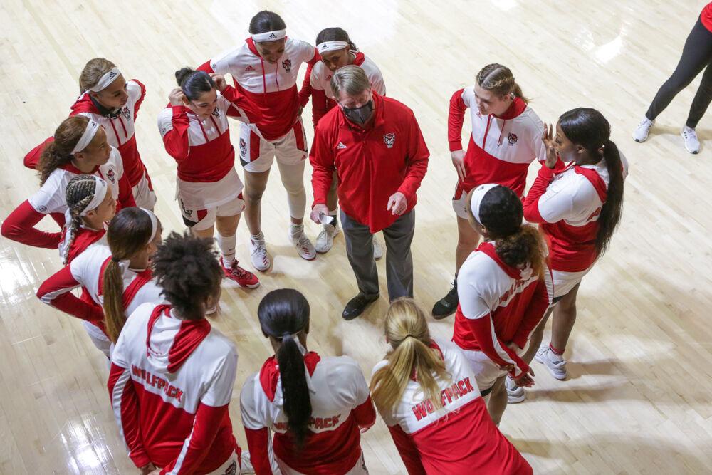 The team huddles as No. 4 NC State women&#8217;s basketball prepares to take on Clemson on Thursday, Feb. 11, 2021 in Reynolds Coliseum.