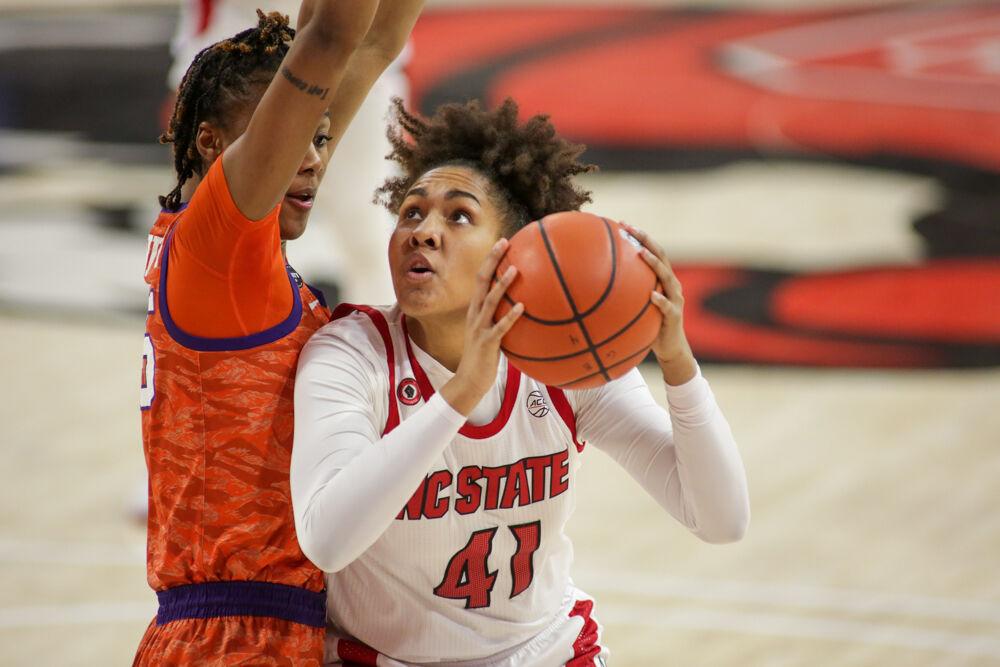 Sophomore center Camille Hobby takes it to the rim. No. 4 NC State women&#8217;s basketball took on Clemson on Thursday, Feb. 11, 2021 in Reynolds Coliseum.