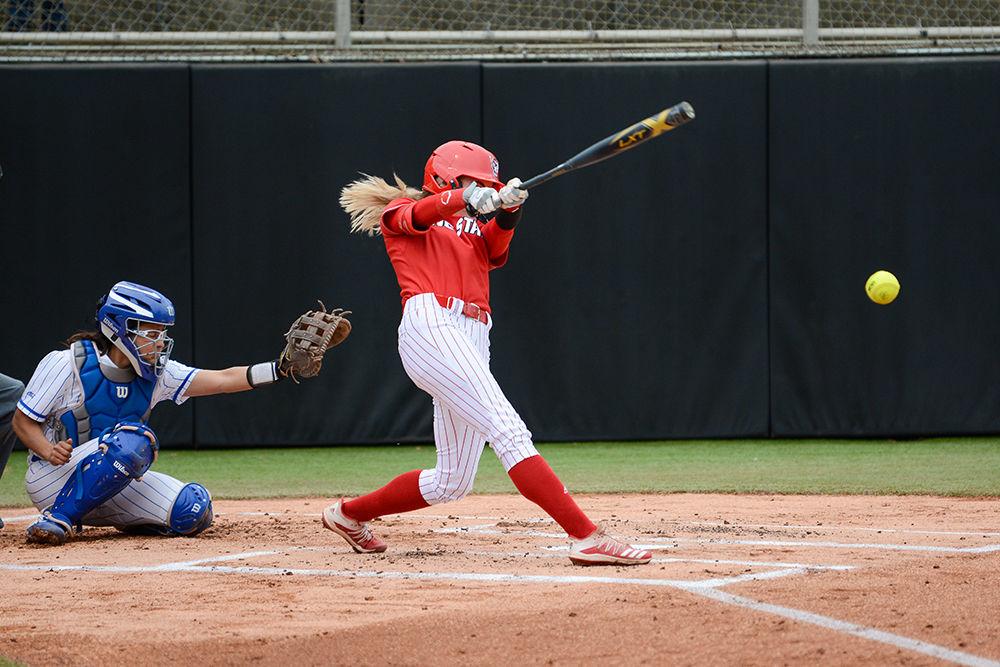 Sam Russ, a junior left fielder, swings at the softball game against Duke on Wednesday, Feb. 26, 2020 at Dail Field. The Wolfpack lost to the Blue Devils 1-5.