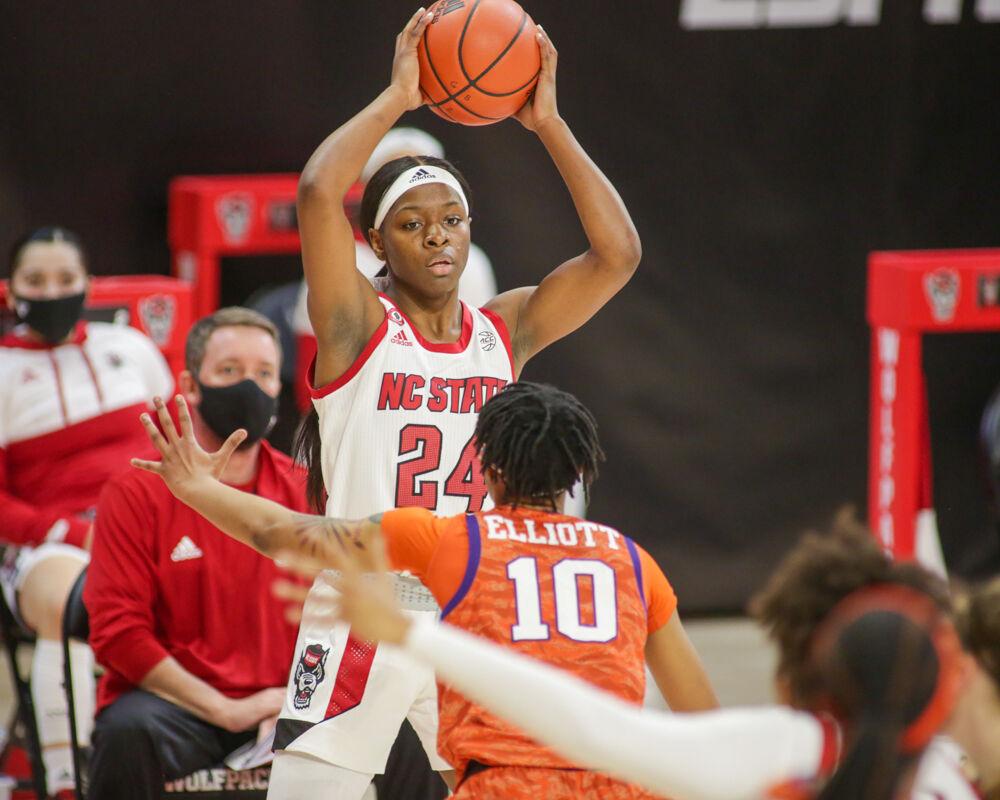 Freshman guard Dontavia Waggoner looks to pass the ball as No. 4 NC State women&#8217;s basketball took down Clemson 86-65 on Thursday, Feb. 11, 2021 in Reynolds Coliseum.