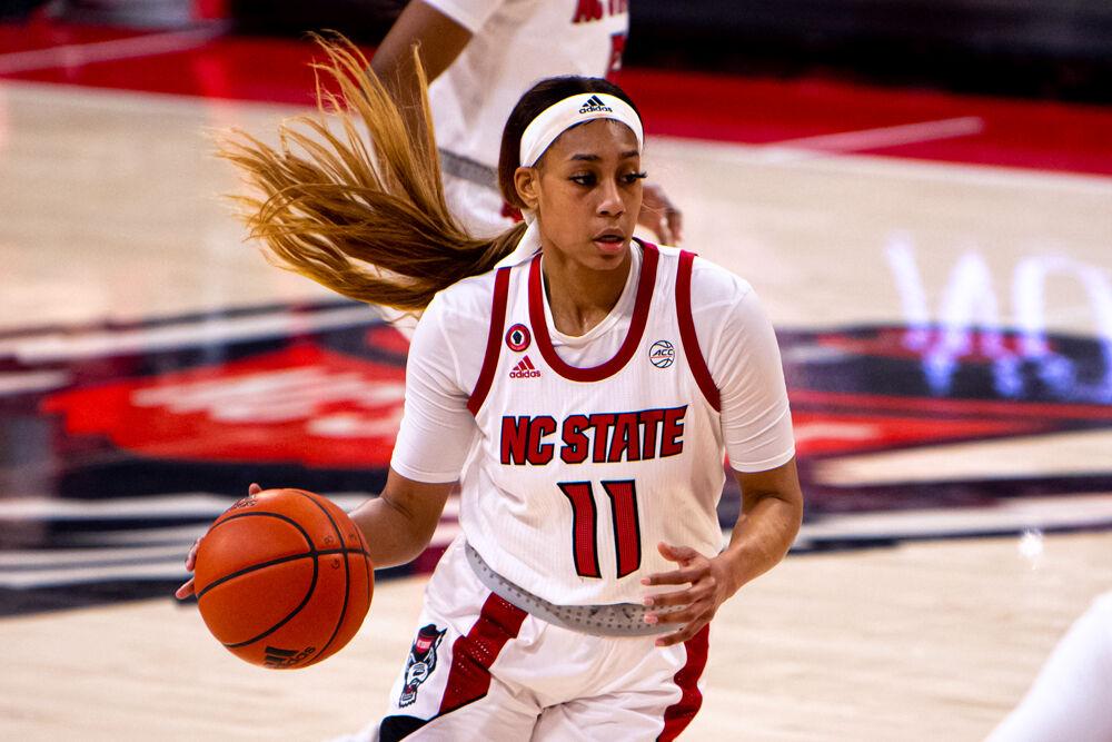 Sophomore wing Jakia Brown-Turner drives against Clemson on Thursday, Feb. 11, 2021 at Reynolds Coliseum. Brown-Turner recorded 13 points and five rebounds as the Wolfpack won 86-65.
