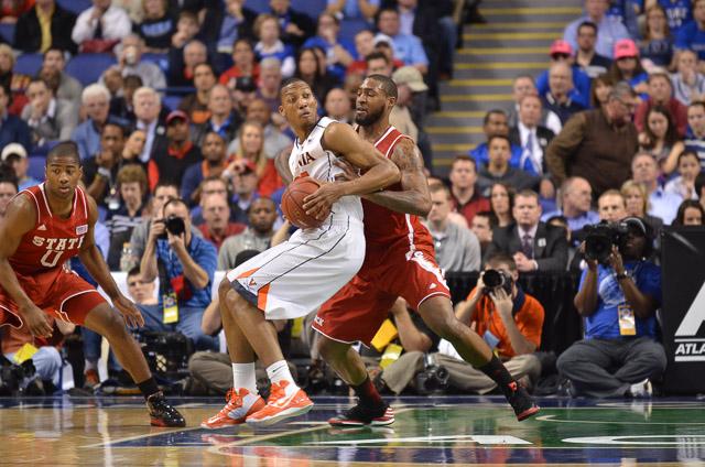 Senior forward Richard Howell defends the paint during the second game of the ACC Tournament against Virginia in Greensboro Coliseum Friday, March 15, 2013. The Wolfpack defeated the Cavaliers 75-56. Photo by John Joyner.