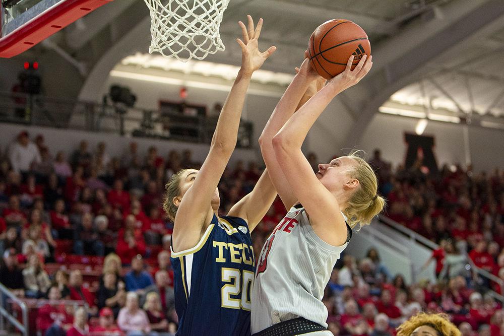 Sophomore center Elissa Cunane attacks the basket against Georgia Tech center Nerea Hermosa on Sunday, Feb. 16, 2020 at Reynolds Coliseum. Cunane recorded 17 points, five rebounds and five turnovers as the Wolfpack lost 65-61.