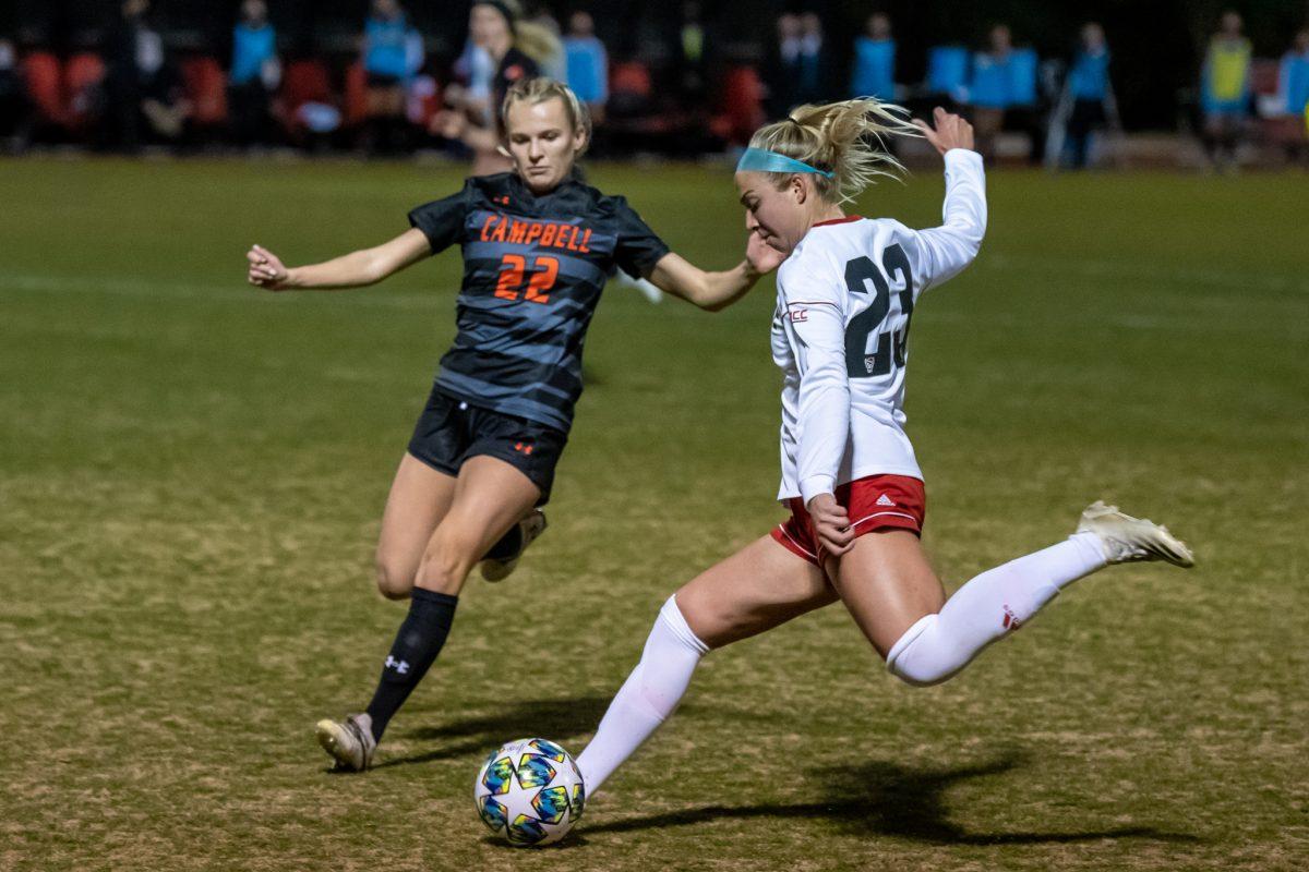 Freshman defender Cara Elmendorf clears the ball during the game versus the Campbell Camels on Tuesday, Feb. 16, 2021 in Dail Soccer Stadium. The Wolfpack beat the Camels 1-0.