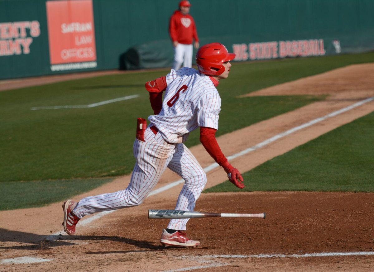 Sophomore infielder Vojtech Mensik runs to first base after a hit on Friday, March 5, 2021 at Doak Field. Mensik had one hit with one run scored during the Wolfpack&#8217;s 11-5 win over the sixth ranked Miami Hurricanes.