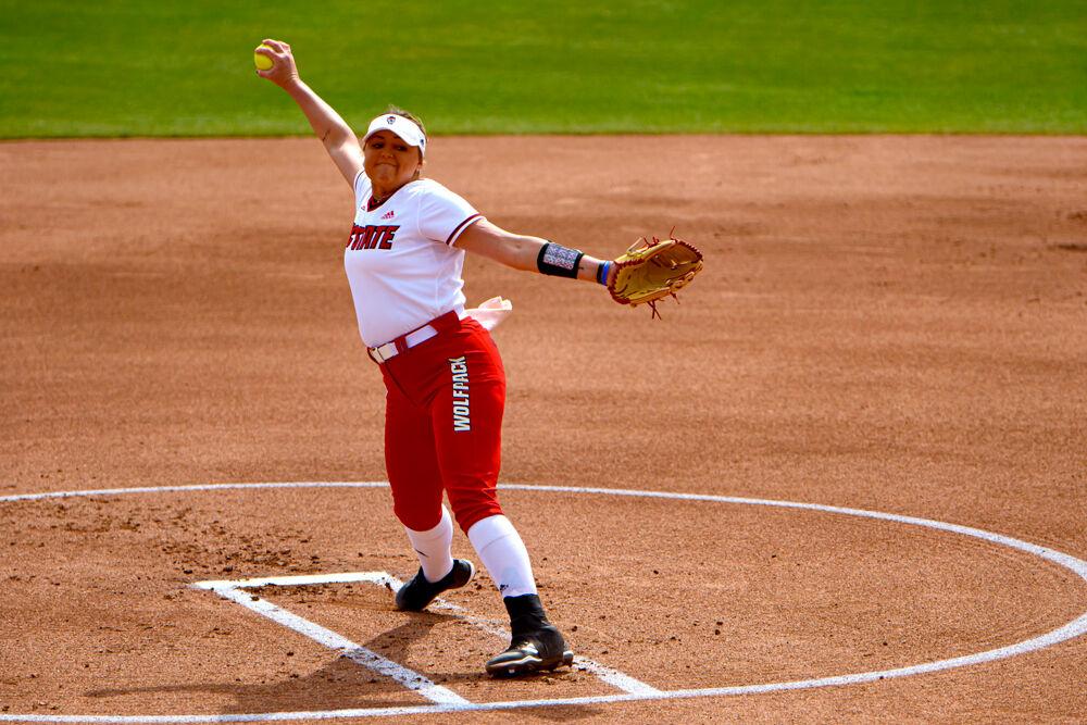 Redshirt senior pitcher Abby Trahan winds up against Virginia Tech on Sunday, March 14, 2021 at Dail Softball Stadium. Trahan pitched two innings, giving up nine earned runs on seven hits while striking out two. The Wolfpack lost 17-4.