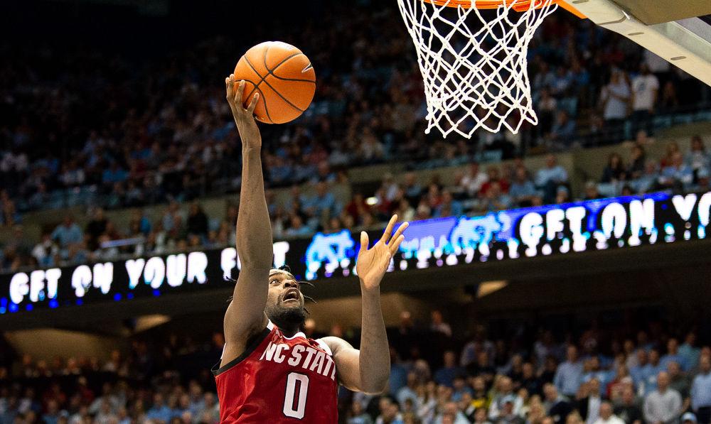 Redshirt junior forward D.J. Funderburk takes an inside shot against North Carolina on Tuesday, Feb. 25, 2020 at the Dean E. Smith Center. Funderburk recorded 18 points and nine rebounds as the Wolfpack lost 85-79.