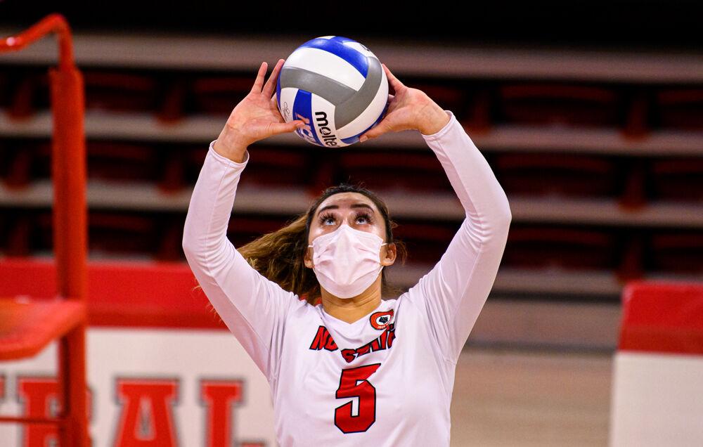 Sophomore setter Kristen McDaniel sets the ball against Duke on Friday, Feb. 26, 2021 at Reynolds Coliseum. McDaniel recorded 45 assists and 16 digs as the Wolfpack won in five sets.