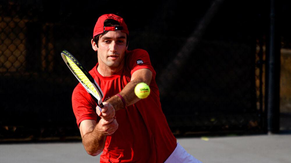 Junior Rafa Izquierdo Luque returns the ball against Florida State on Friday, March 12, 2021 at J.W. Isenhour Tennis Center. Izquierdo Luque won his singles match 6-3, 6-1, helping the Wolfpack to a 4-0 victory over the Seminoles.