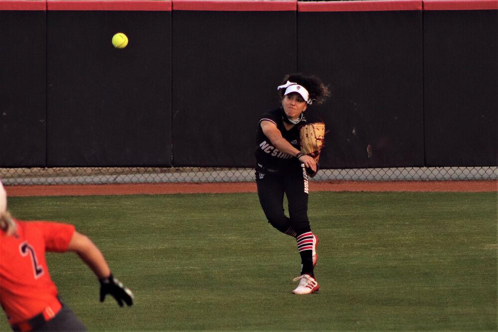 Redshirt senior outfielder, Angie Rizzi, throws the ball to second base to get a Hokies' player out on Friday, Mar. 12 at Dail Softball Field. NCSU lost to Virginia Tech 2-4
