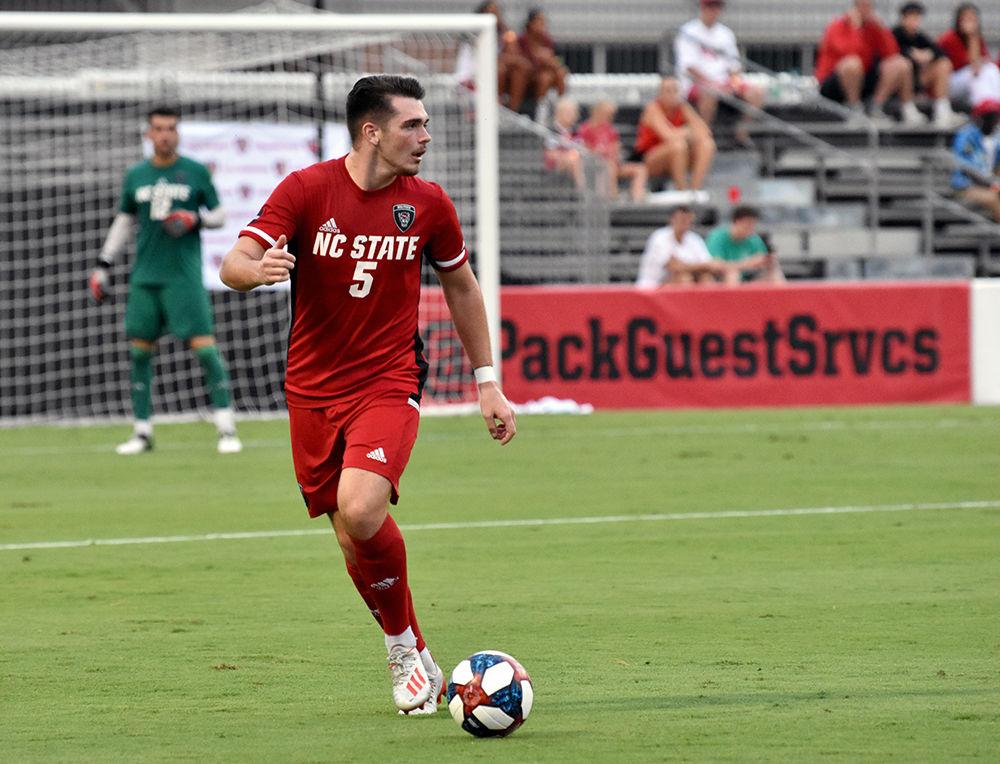 Junior defender Jamie Smith prepares to pass the ball during the NC State men's soccer game against Notre Dame on Friday, Oct. 4, 2019 at Dail Soccer Stadium. Smith took one shot on goal against Notre Dame. NC State beat the Fighting Irish 2-0.