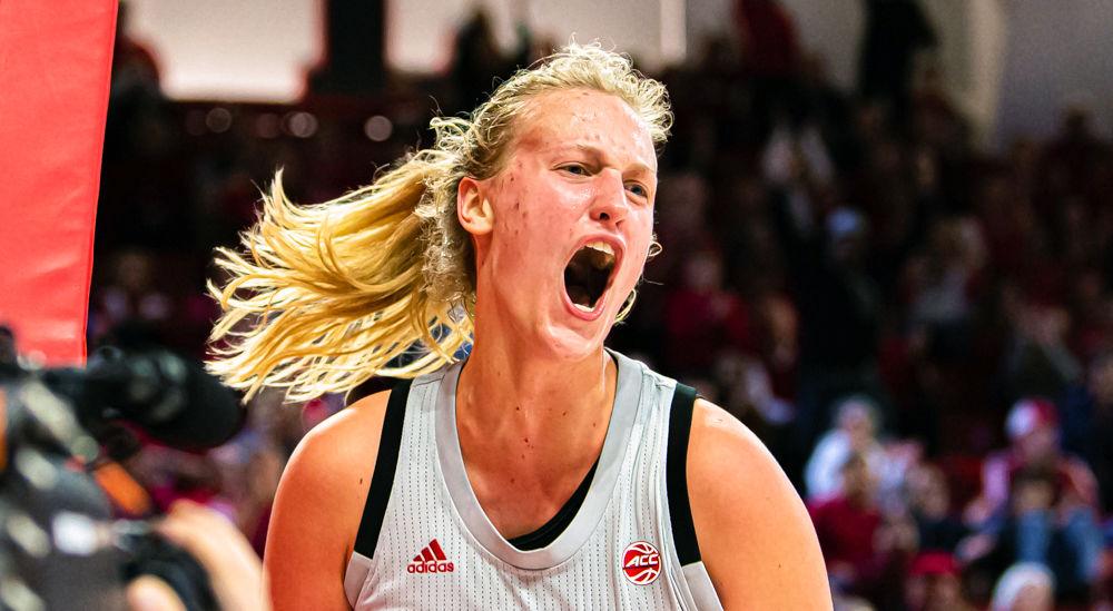 Sophomore center Elissa Cunane celebrates getting a basket and a foul against Virginia Tech on Thursday, Jan. 2 at Reynolds Coliseum. Cunane tied her career-high of 28 points as the Wolfpack won 76-69.