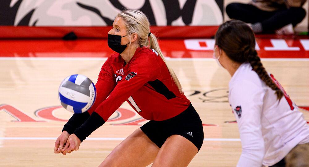 Redshirt junior defensive specialist/libero Kaylee Frazier digs against Duke on Friday, Feb. 26, 2021 at Reynolds Coliseum. Frazier had 17 digs as the Wolfpack won in five sets.