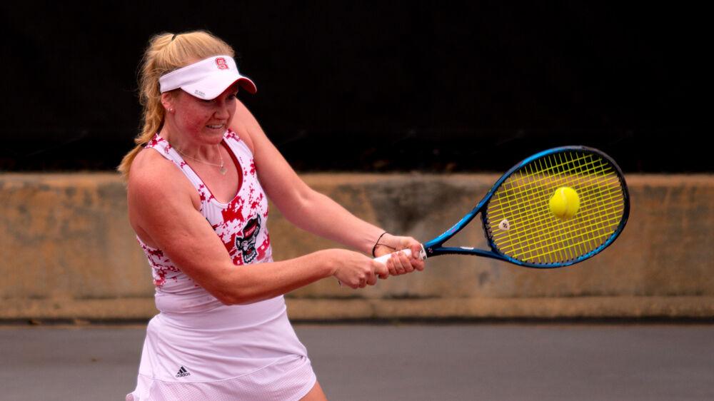 Senior Lexi Keberle returns the ball against UNC-Charlotte on Wednesday, March 24, 2021 at J.W. Isenhour Tennis Center. The Wolfpack won 5-0.