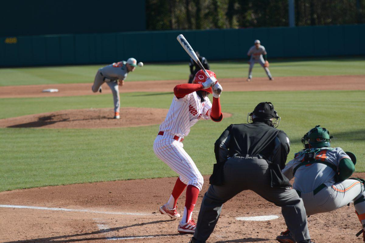 Freshman shortstop Jose Torres bats on Friday, March 5, 2021 at Doak Field. Torres finished with 2 hits and 2 RBIs in the Wolfpack&#8217;s 11-5 win over the Miami Hurricanes.