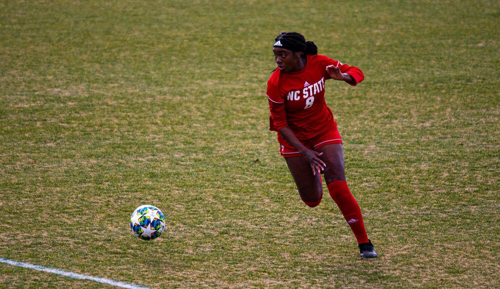 Junior forward Denae Antoine dribbles against Old Dominion on Sunday, Feb. 7, 2021 at Dail Soccer Field. Antoine scored once as the Wolfpack won the season-opener 2-0.