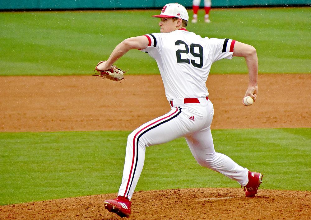Sophomore pitcher Reid Johnston pitches at Doak Field on Sunday, Feb. 17, 2019. Johnston pitched 3.1 innings, giving up three hits and striking out four as NC State won 12-8.