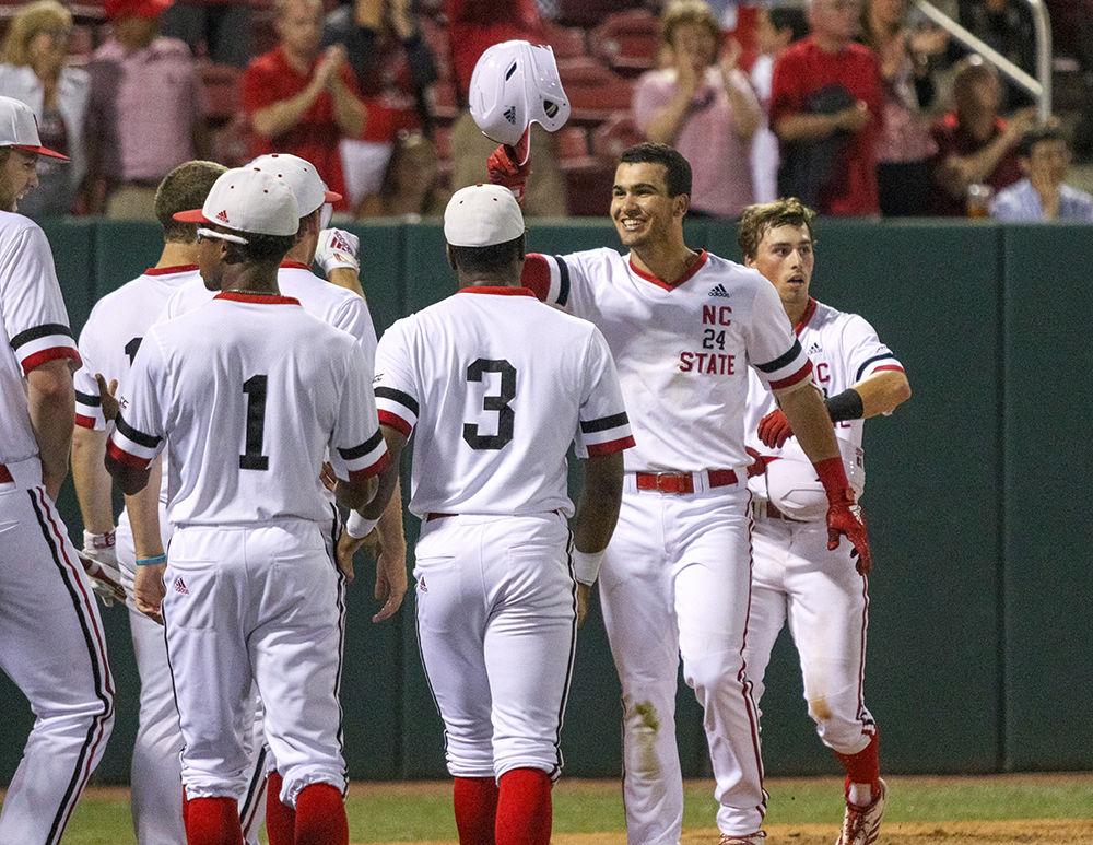 Freshman outfielder Luca Tresh is welcomed to the huddle after hitting a home run resulting in three scores during the 10-6 win over Tennessee Tech at Doak Field on Tuesday, April 23.
