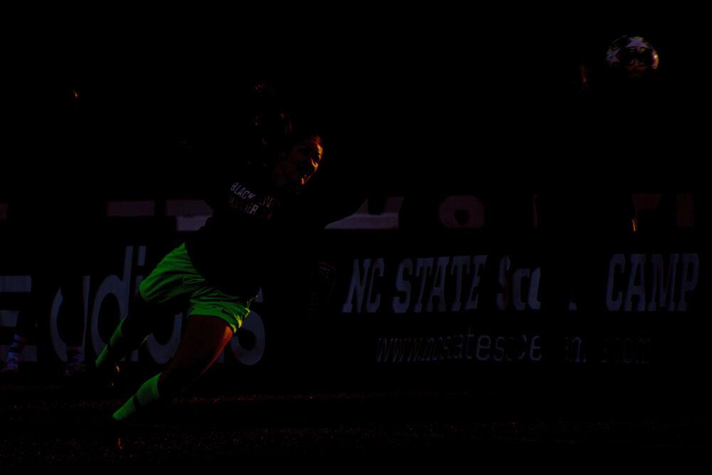 Duke goalkeeper Ruthie Jones warms up before playing NC State on Friday, April 2, 2021 at Dail Soccer Field. The Blue Devils won 1-0.