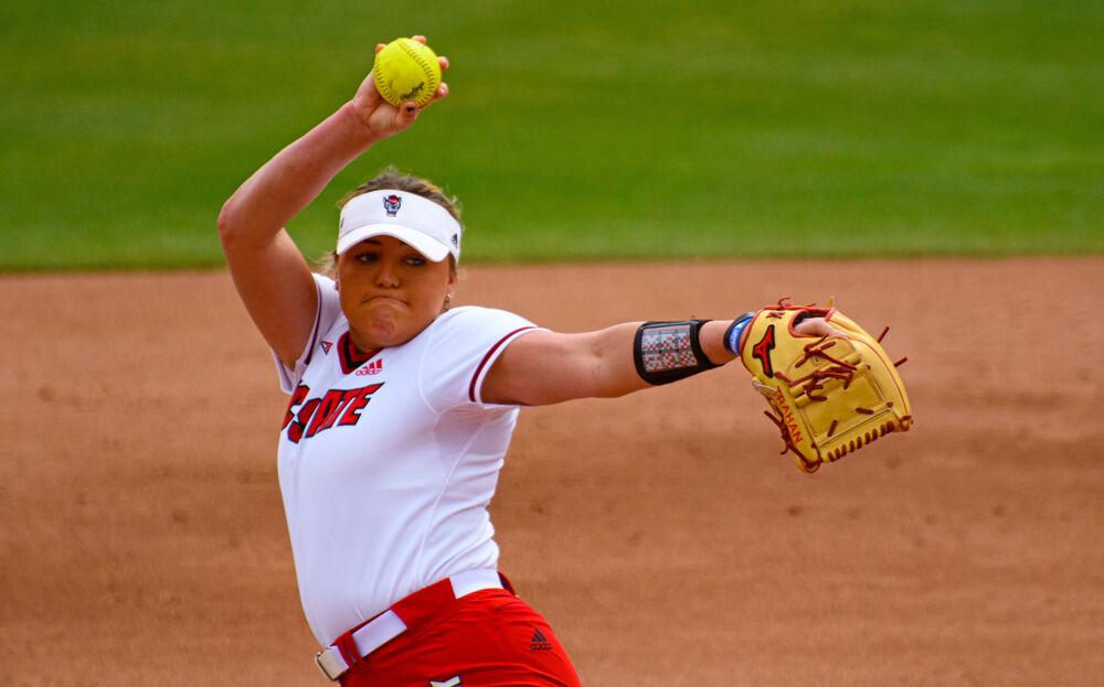 Redshirt senior pitcher Abby Trahan winds up against Virginia Tech on Sunday, March 14, 2021 at Dail Softball Stadium. Trahan pitched two innings, giving up nine earned runs on seven hits while striking out two. The Wolfpack lost 17-4.