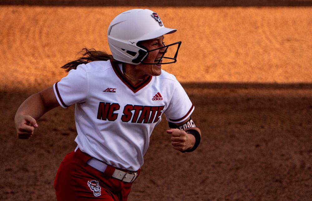 Redshirt junior infielder Logan Morris celebrates her home run against No. 15 LSU on Friday, April 16, 2021 at Dail Softball Stadium. Morris went 2-3 with three runs batted in as the Wolfpack won 3-1.