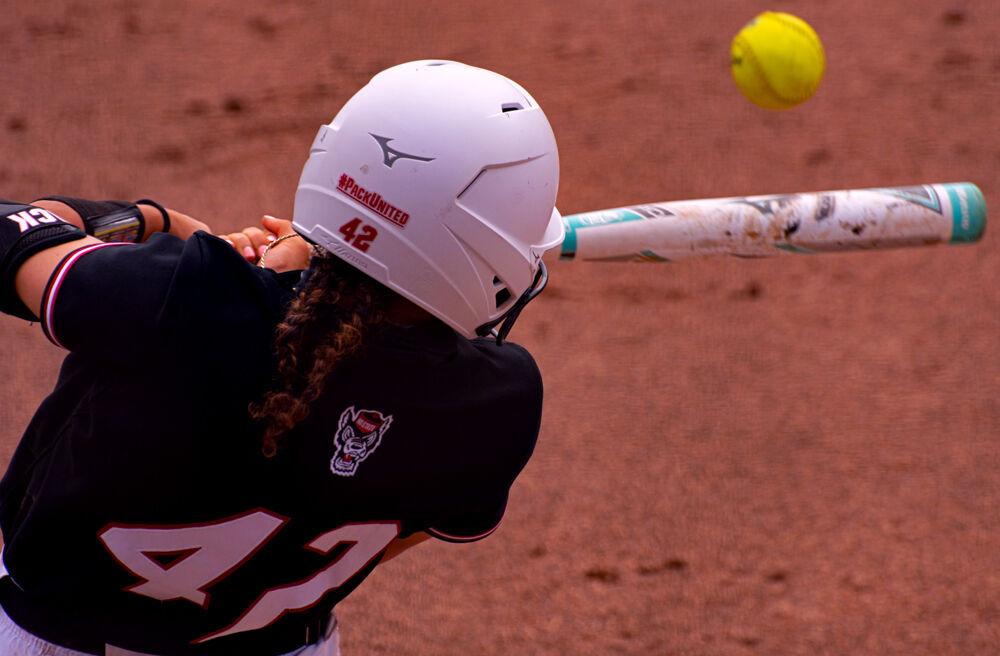 Redshirt senior outfielder Angie Rizzi hits against Pittsburgh on Saturday, April 10, 2021 at Dail Softball Stadium. The Wolfpack won the first game of the doubleheader 7-3 and Rizzi went 3-4 with a home run, a double and a stolen base.