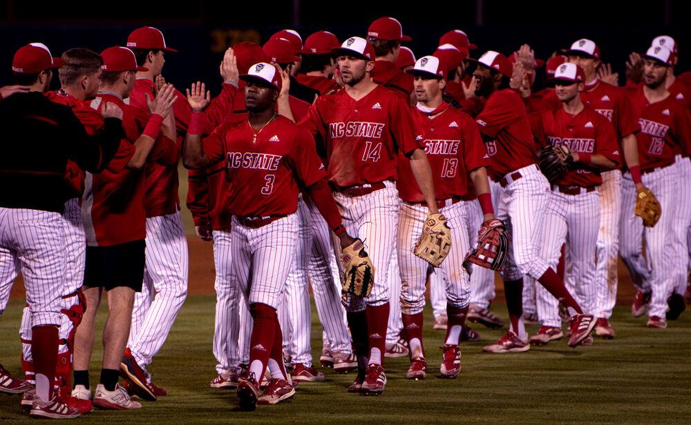 NC State Baseball celebrates the win over Virginia Tech on Friday, April 23, 2021 at Doak Field. The Wolfpack won 3-1.