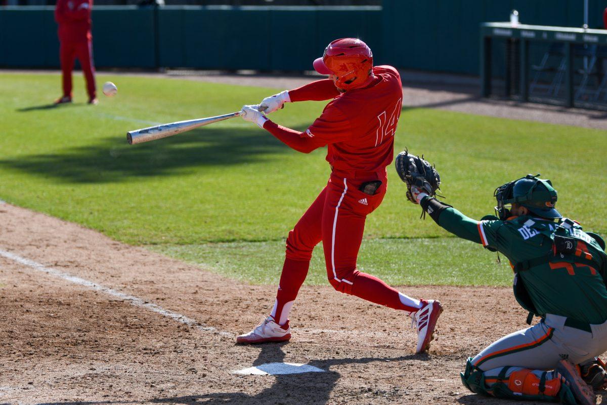 Junior outfielder Jonny Bulter hits a home run during the game verus the Miami Hurricanes on Sunday, March 7, 2021 in Doak Field at Dail Park. Bulter scored one run for the Wolfpack. The Hurricanes beat the Wolfpack 6-4.