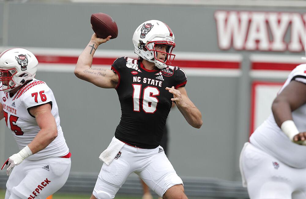 N.C. State quarterback Aaron McLaughlin (16) passes during the first half of N.C. State football&#8217;s spring game at Carter-Finley Stadium in Raleigh, N.C., Saturday, April 10, 2021.
