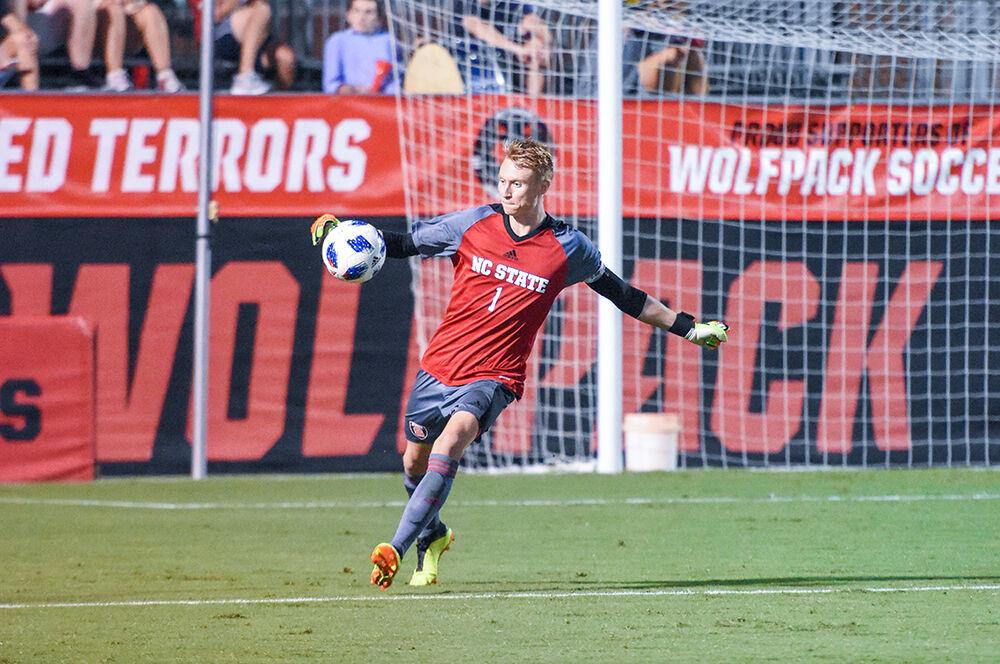 Sophomore goalkeeper Leon Krapf kicks the ball downfield against James Madison University on Tuesday, Oct. 2, 2018 at Dail Soccer Field. The game went into overtime and ended in a 0-0 draw. Krapf had four saves.