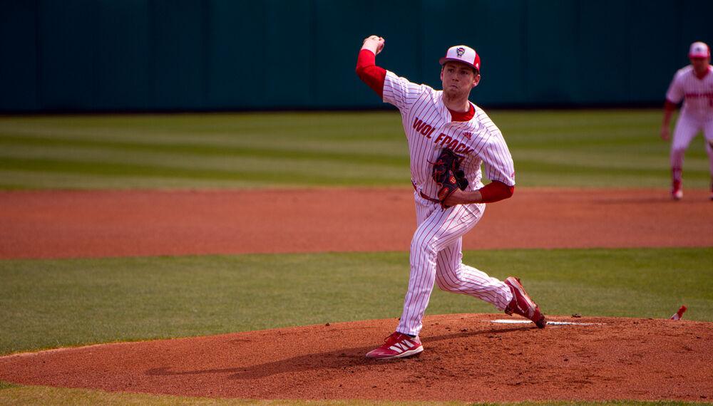 Freshman pitcher Sam Highfill pitches against Louisville on Saturday, March 20, 2021 at Doak Field. Highfill pitched four and two-thirds innings, giving up two earned runs on four hits while striking out three. The Wolfpack lost 6-3.